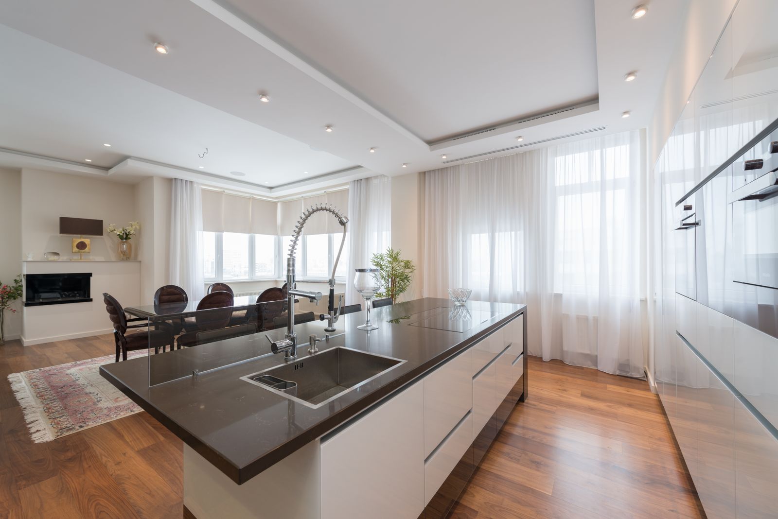 Modern kitchen island with an integrated workstation sink